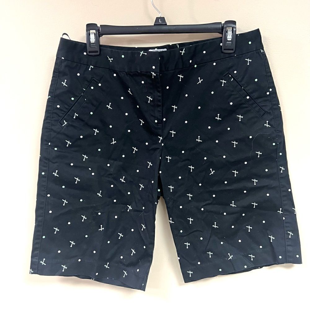 IZOD tee print black golf shorts.  Size 10
